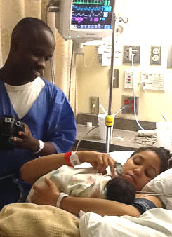 Mother and father with son in room 428 in the Mother and Baby Center (4th Floor in the Memorial Hospital