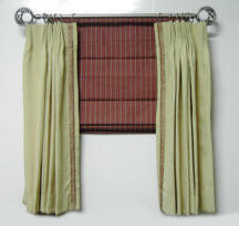 Fan-pleated curtains with tucked-roman shade
